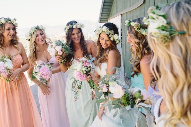 Bride with bridemaid's with floral accessories 